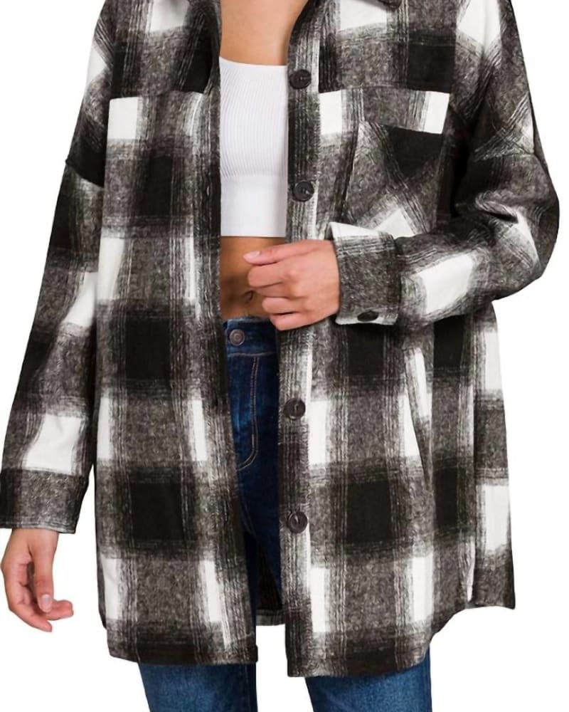 Front of a model wearing a size Xlarge Oversized Buffalo Plaid Shacket in White/Black in White/Black by Zenana. | dia_product_style_image_id:326623